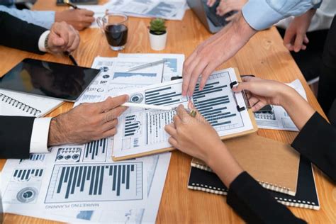 Group of Business Analyst Team Analyzing Financial Data Report ...