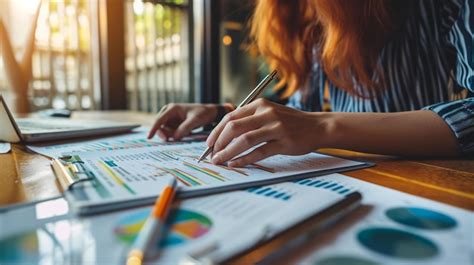 Premium Photo | A person reviewing financial statements and budgets