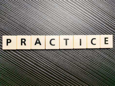 Premium Photo | Word practice made from square letter tiles against ...