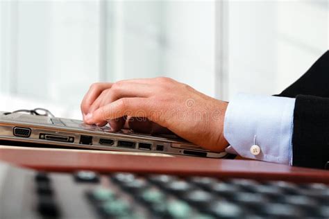 Worker Typing on a Laptop Computer Stock Photo - Image of working ...