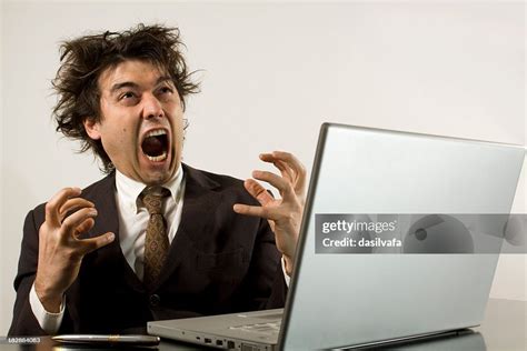 Crazy Businessman Frustrated With His Computer High-Res Stock Photo ...