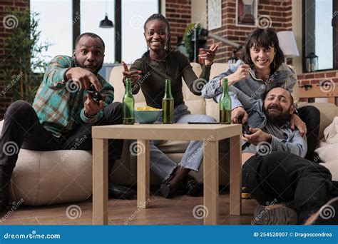 Diverse Group of People Enjoying Video Games Play on Gaming Console ...