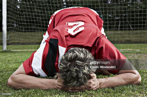 Frustrated Soccer Player On Field High-Res Stock Photo - Getty Images