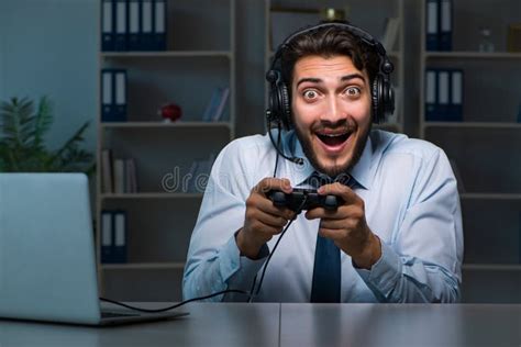 The Businessman Gamer Staying Late To Play Games Stock Photo - Image of ...