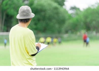 92 Coach Observing Young Athletes Royalty-Free Images, Stock Photos ...