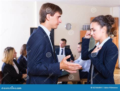 Angry Manager And Employee At Office Stock Photo - Image: 62166404