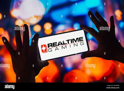 In this photo illustration, the Realtime Gaming logo is displayed on a ...