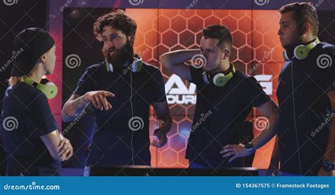 Gaming Team Discussing Strategy Stock Image - Image of woman ...