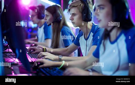 Team of Professional eSport Gamers Playing in Competitive Video Games ...