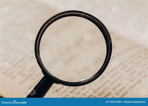 Small Magnifying Glass on Paper with Text. Search, Analysis Stock Photo ...