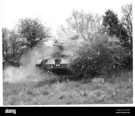 TANKS IN ACTION - Cruiser tanks smashing through walls and hedges ...