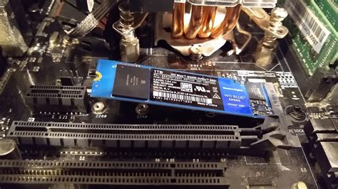 How do I install an M.2 NVMe SSD for faster game loading times?