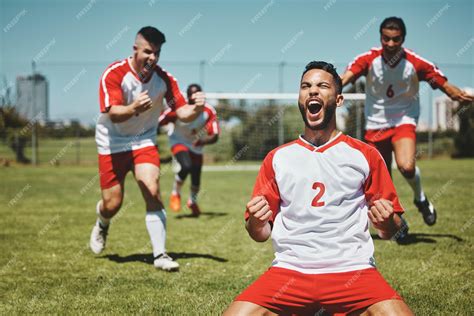Premium Photo | Team success and winner by soccer player celebration ...