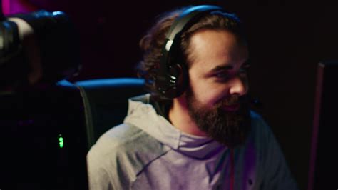 Esports player playing videogames in front of subscribers during ...