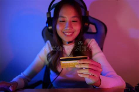 Female Gamer Make Purchase within Game, Gamer Holding Credit Card Stock ...