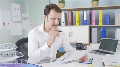 Thoughtful work, pondering. 43228461 Stock Video at Vecteezy