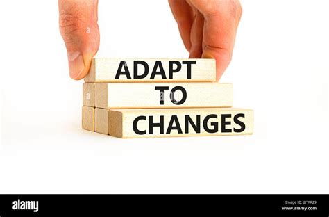 Adapt to changes symbol. Concept words Adapt to changes on wooden ...