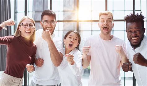 Business Team Celebrating Victory in the Office Stock Photo - Image of ...