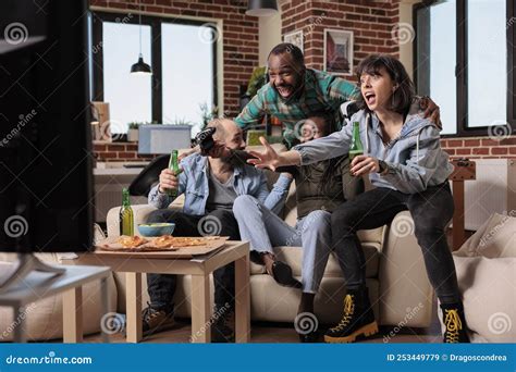 Diverse Group of Friends Celebrating Video Games Victory Stock Image ...