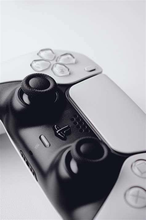 A close up of a video game controller photo – Free Sony Image on Unsplash