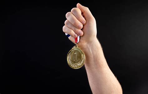 Download Gold Medal Victory Wallpaper | Wallpapers.com