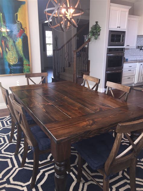 Dark Wood Dining Table with Brass Legs