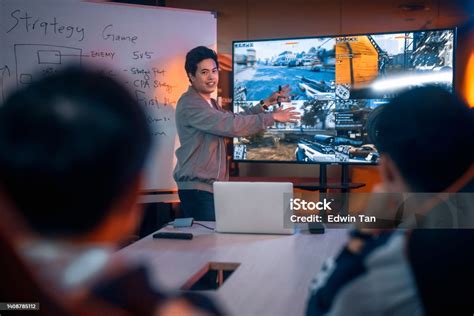 Asian Chinese Esport Team Coach Analysing Briefing Strategy To Team ...