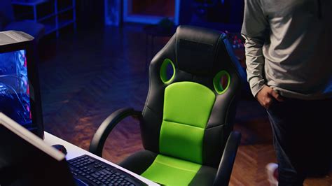 Gamer streaming, greeting audience, preparing to showcase video game ...