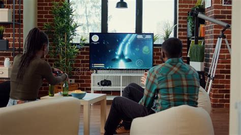 Diverse People Having Fun with Video Games Challenge Stock Photo ...